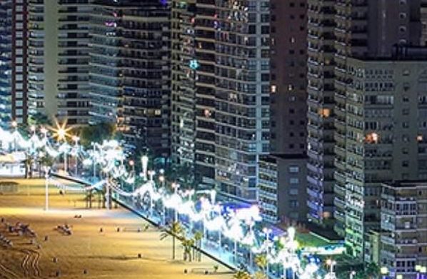 Benidorm beachfront illuminated after dark